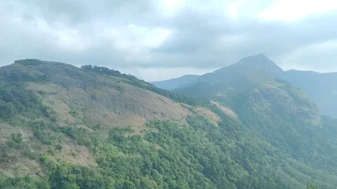 Panoramic Misty Green Mountains in Nelliyampathy, Palakkad, Kerala - Pan Shot Stock Footage 339588517