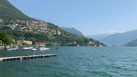 Panoramic motion view of Lago di Como lake. View from Cernobbio town pier Stock Footage 159570170