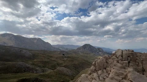 Panoramic Mountain Landscape with Dramatic Clouds Stock Footage 343831025