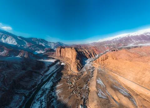 Panoramic mountain landscape with red cliffs and river Фото