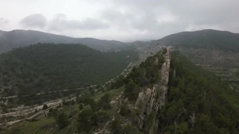 Panoramic mountain peak on the background of the valley and mountains Stock Footage 239942373