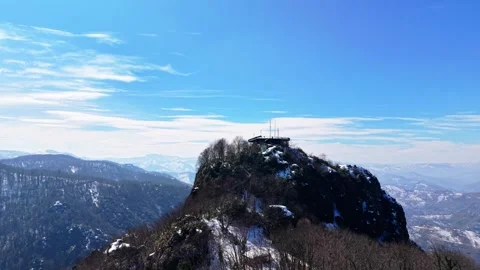 Panoramic Mountain Summit Terrace View with Snowy Peaks Forests and Blue Sky 4K Stock Footage 334548788