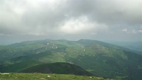 Panoramic Mountain View with Forest in Cloudy Weather Stock Footage 161482559