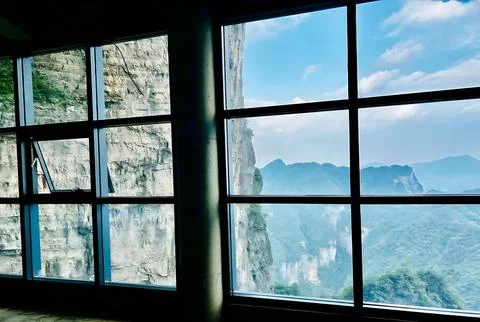 Panoramic Mountain View Through Large Glass Windows in Zhangjiajie National.. Stock Photos