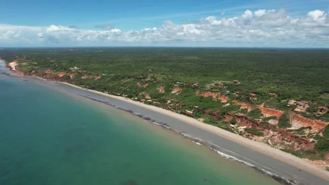 Panoramic movement with Drone in small paradisiacal beach with green sea Stock Footage 240896811