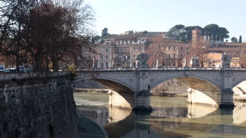Panoramic movement on the Tiber river along Ponte Sant'Angelo in Rome, Italy Stock Footage 145282667
