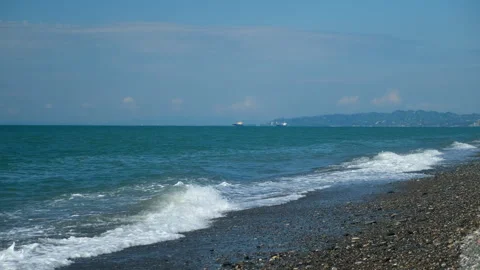 Panoramic nature background with pebble beach, mountains and sea port. Stock Footage 255109618