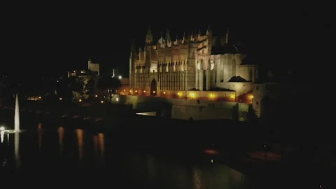 Panoramic Night Shot of Lighted Mallorca Cathedral in Palma, Spain Stock Footage 252603885