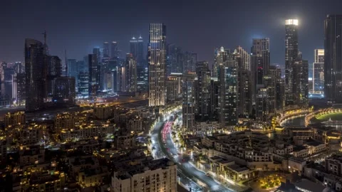 Panoramic night time lapse view of the Dubai Downtown skyline Stock Footage 261190454