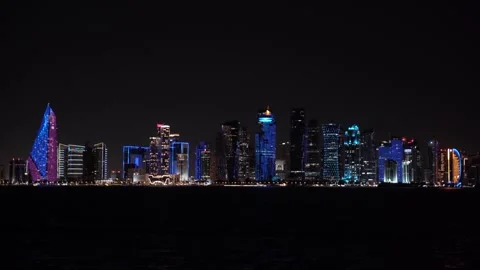 Panoramic night view of the illuminated West Bay skyline in Doha, Qatar. Stock Footage 336716030