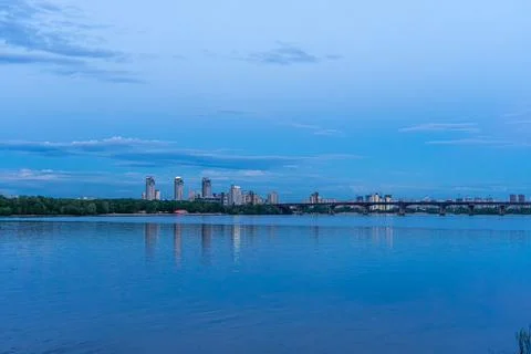 Panoramic night view of left bank of Dnypro river in Kyiv, Ukraine Stock Photos