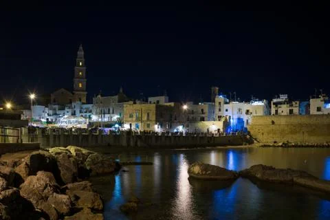 Panoramic nightview of Monopoli Stock Photos