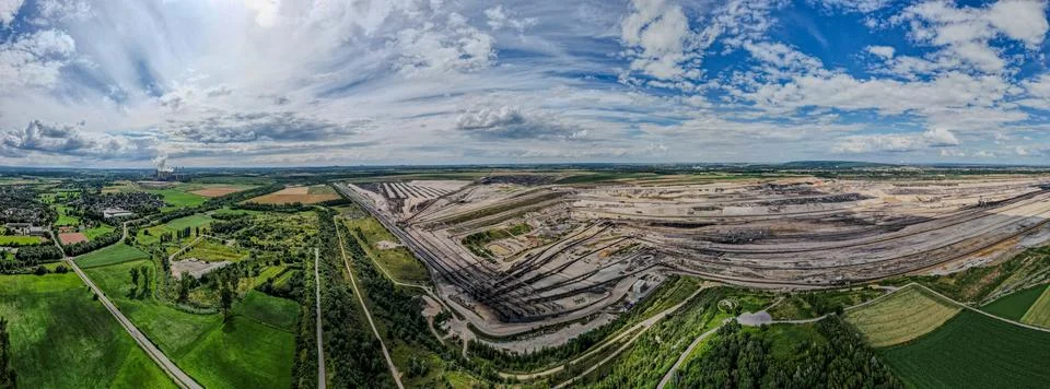 Panoramic Open Pit Mine with Layered Terraces from Above Stock Photos