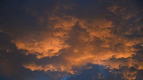 Panoramic of orange crispy clouds of blue sky at sunset Stock Footage 106309254
