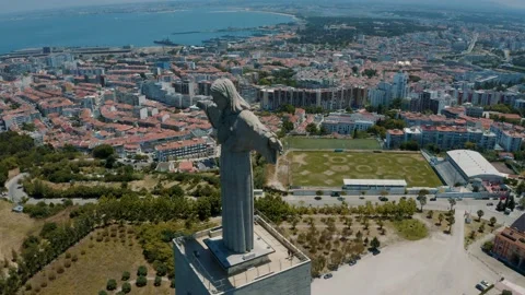 Panoramic orbit view over the Statue Santuario De Cristo Rei, Lisbon Portugal 4K Stock Footage 162957841