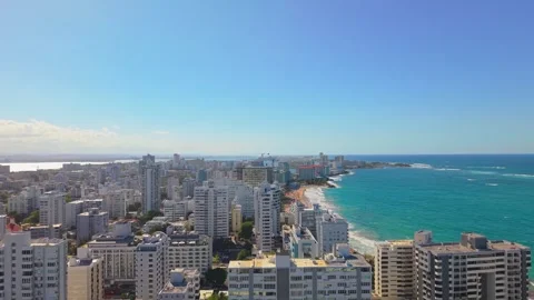 Panoramic overhead view of Condado Beach waterfront resorts, white sand beach Stock Footage 346881926