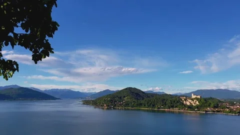 Panoramic panning view of Lake Maggiore and Angera castle with Alps Видео 279907278