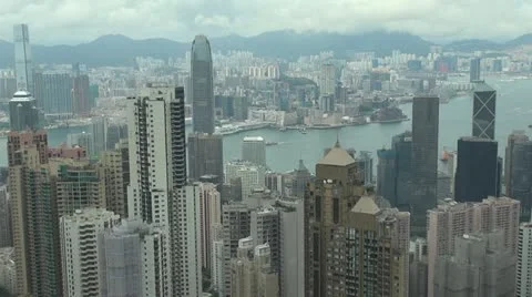 Panoramic panorama view pan right aerial view Hong Kong city cloudy day China Stock Footage 11120707