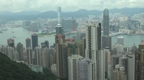 Panoramic panorama view pan right aerial view Hong Kong city cloudy day China Stock Footage 11311908
