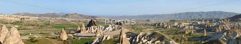 Panoramic photo of unusual rocky landscape in Cappadocia, Turkey Stock Photos