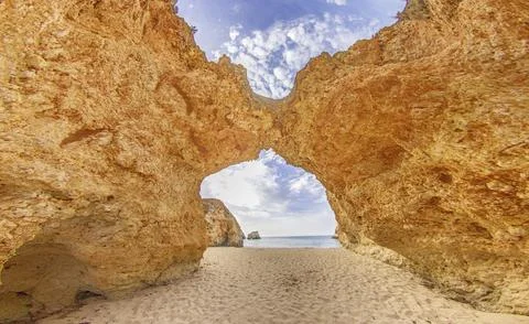 Panoramic picture between the cliffs at Praia do Prainha on the Portuguese .. Stock Photos