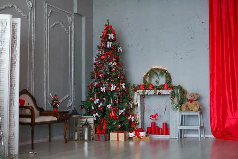 Panoramic plan of the room with a Christmas tree and a sofa Stock Photos