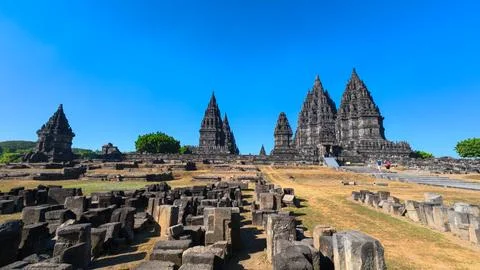 Panoramic Prambanan Temple complex beneath vivid blue sky Stock-Fotos