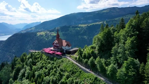 A Panoramic Restaurant hotel on top of a mountain in Switzerland, Harder kulm Stock Footage 247086594