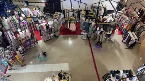 Panoramic Retail Experience Unveiling Extensive Apparel Assortments and Int.. Stock Footage 335119188