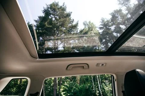 Panoramic roof, dashboard. The view from the empty car Stock Photos