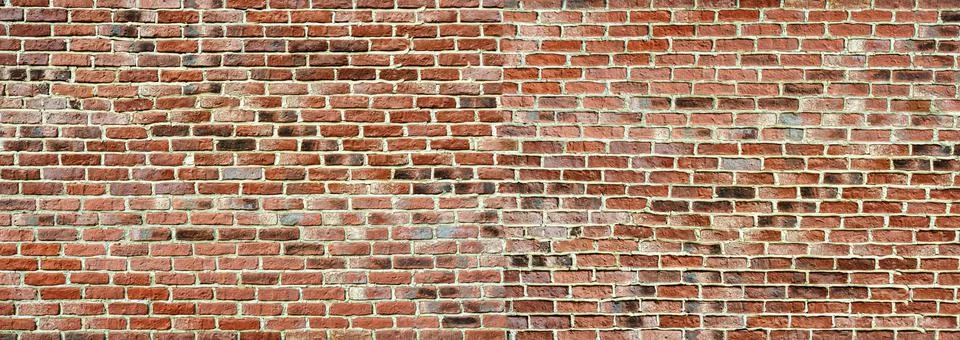 Panoramic rugged old red brown bricks wall. texture background Photos
