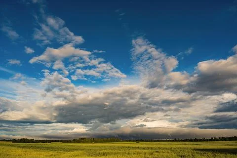Panoramic rural landscape with dramatic storm clouds 写真素材