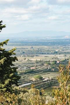 Panoramic rural valley landscape with distant mountains Fotos Stock