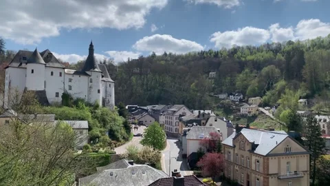 Panoramic, scenic view of Clervaux Castle and Clervaux town houses. Luxembourg Stock Footage 308528934