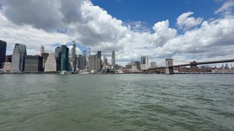 Panoramic, scenic view of Lower Manhattan. East River waves. New York City Stock-Footage 337837588