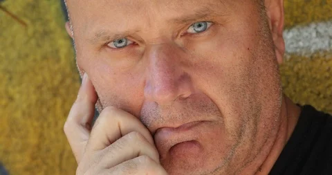 Panoramic Shoot with Extrem Close Up Portrait of a Sad Man Looking Hopeless Stock-Footage 102257840