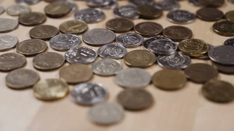 Panoramic shooting of coins lying on the table Stock-Footage 152416481