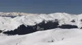 Panoramic Shot Aerial View Pan Left Winter Landscape Snow Covered Cold Mountains HD Footage