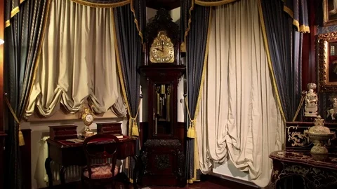 Panoramic shot of an ancient pendulum clock with a ringtone Stock Footage 86675257