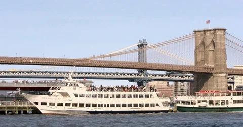 Panoramic shot of Brooklyn and Pier 15, East River Esplanade with ships Stock Footage 77261857