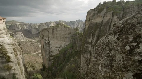 Panoramic shot of a cliffside house in the mountains Stock Footage 113222168