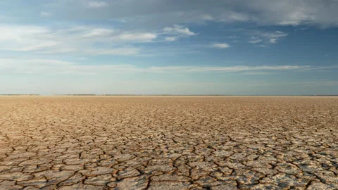 Panoramic shot of cracked soil ground of dried lake or river. Stock Footage 196822172