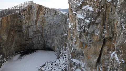 Panoramic shot at edge of vent of long-extinct volcano, crater filled with water Stock Footage 128977756