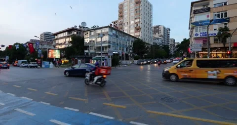 Panoramic shot of intersection of Baghdad street in Kadikoy, evening time Stock Footage 259987034