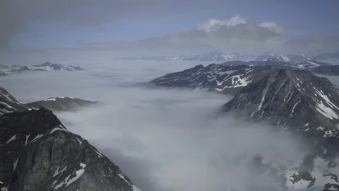 Panoramic shot of Norwegian mountains in the clouds, Tromso, Norway Stock Footage 102154873
