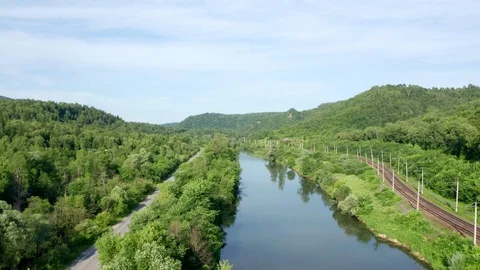 Panoramic shot over the valley with the river in sunny weather. Stock Footage 119067278