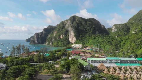 Panoramic shot of phi phi island THAILAND, mountains buildings and ocean views 動画素材 237803399