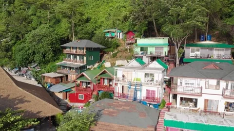 Panoramic shot of phi phi island THAILAND, mountains buildings and ocean views Stock Footage 237803491