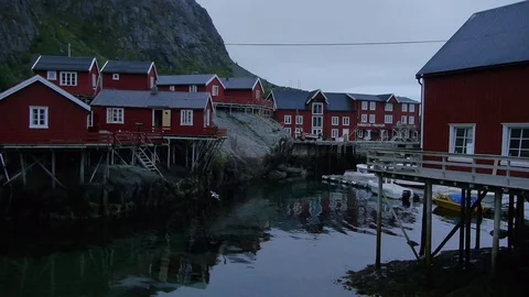 Panoramic shot of a Rorbuer and mountains in Lofoten Islands Stock Footage 71291308