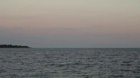 Panoramic shot of  sea in the evening Vídeo Stock 73797502